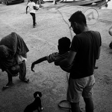 Volunteers are giving the refugees some fun and food.
